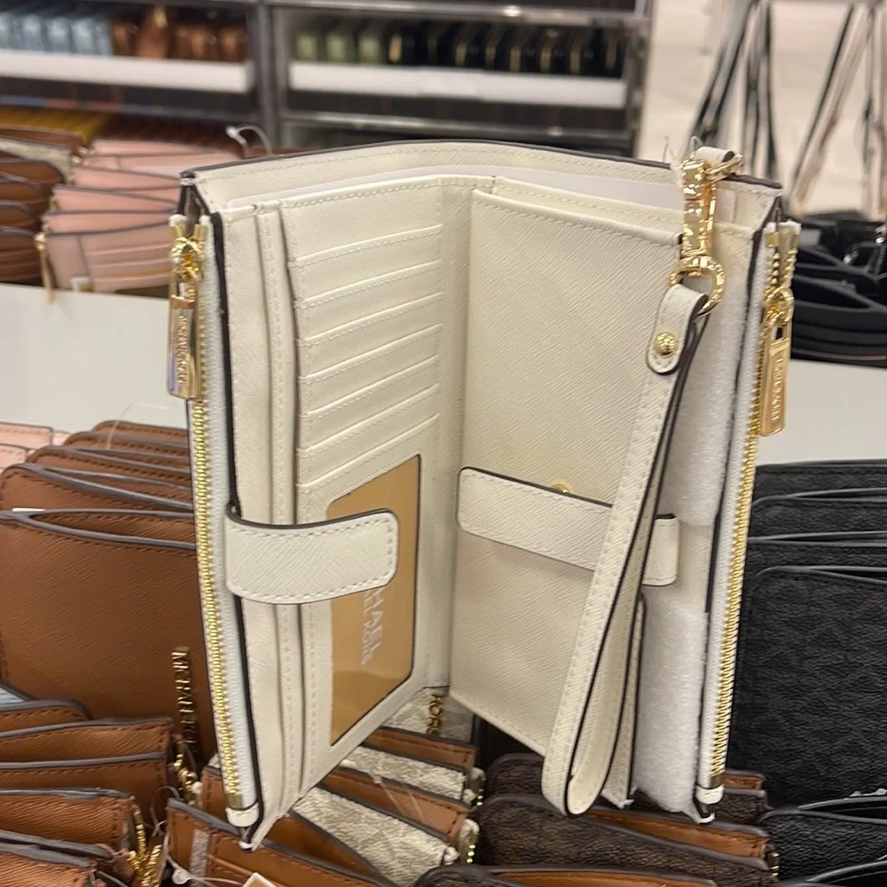 MICHAEL KORS LARGE DOUBLE ZIP WRISTLET WALLET PHONE CASE CLUTCH
Optic White - Picture 10 of 16